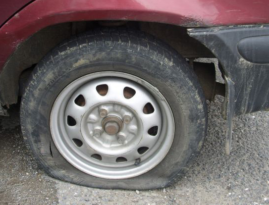 Poškozená pneumatika